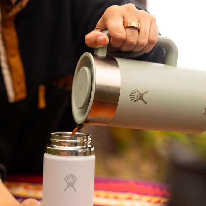 32-oz-insulated-french-press-v7 2706_johnson_s25summertravel_camping_pouring_303a0287_1_.jpg
